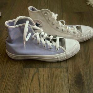 Womens size 8 US. Customized Converse high tops. Barley ever worn.